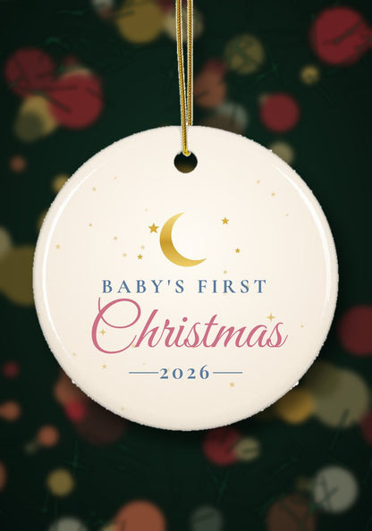 Baby's First Christmas 2026 ornament hanging on a Christmas tree