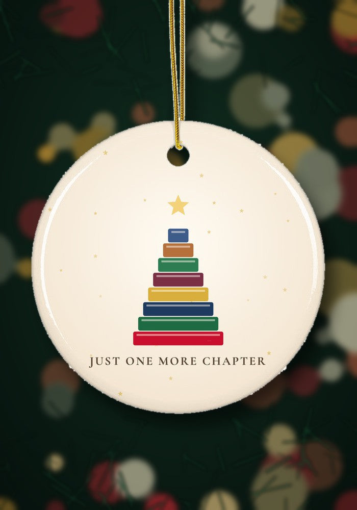 Book lover Christmas ornament with a tree of books hanging on a Christmas tree