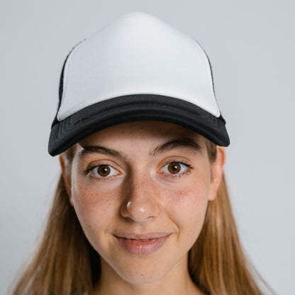 Woman wearing a custom trucker hat