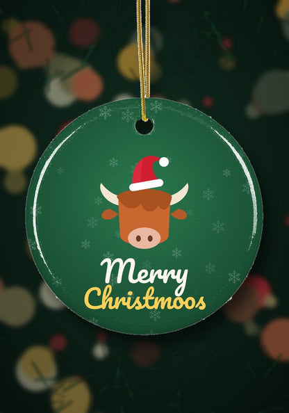 Highland cow Merry Christmoos ornament hanging on a Christmas tree