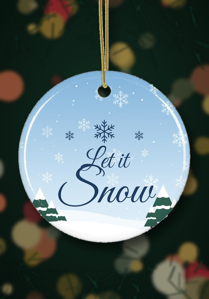 Let It Snow Ceramic Christmas Ornament hanging on a Christmas tree