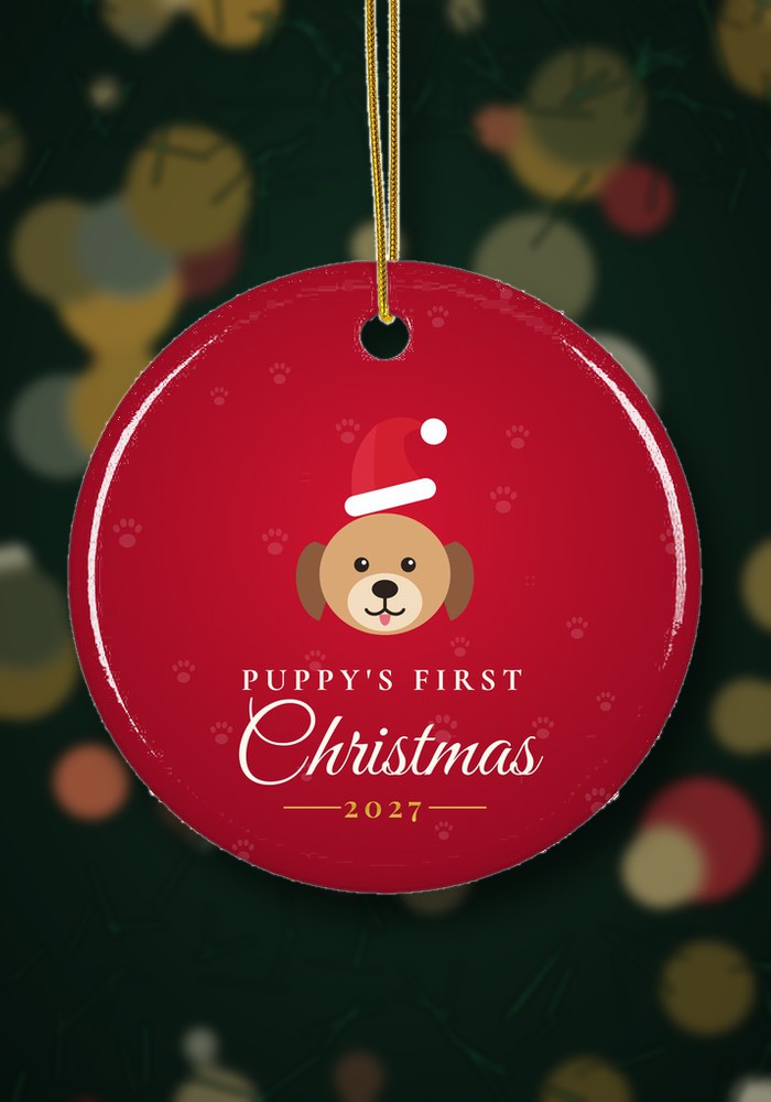 Puppy's First Christmas ornament hanging on a Christmas tree