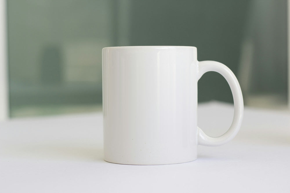 Blank white ceramic mug ready for your custom print