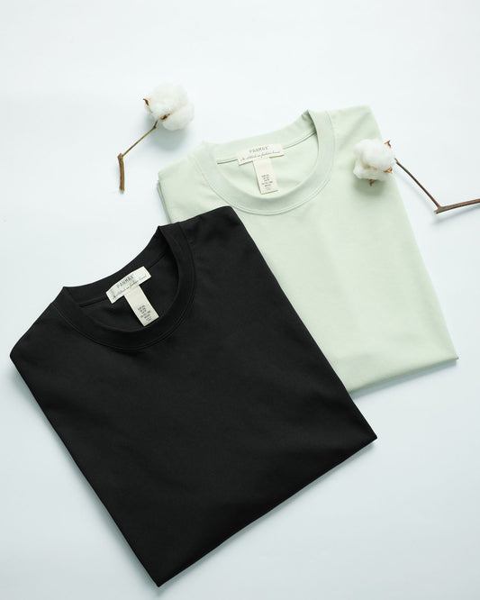 Black and mint cotton T-shirts flat lay