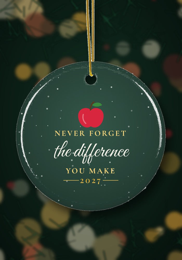 Teacher appreciation Christmas ornament hanging on a Christmas tree