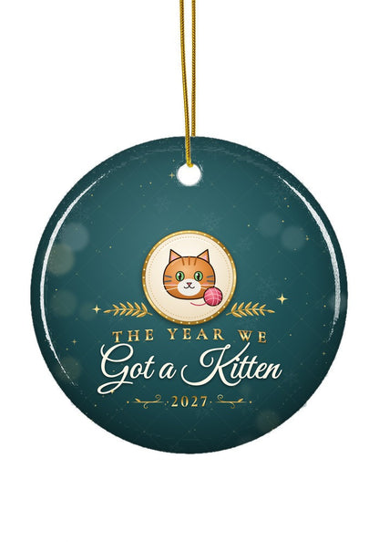 Got a Kitten ornament dated 2027, circle shape