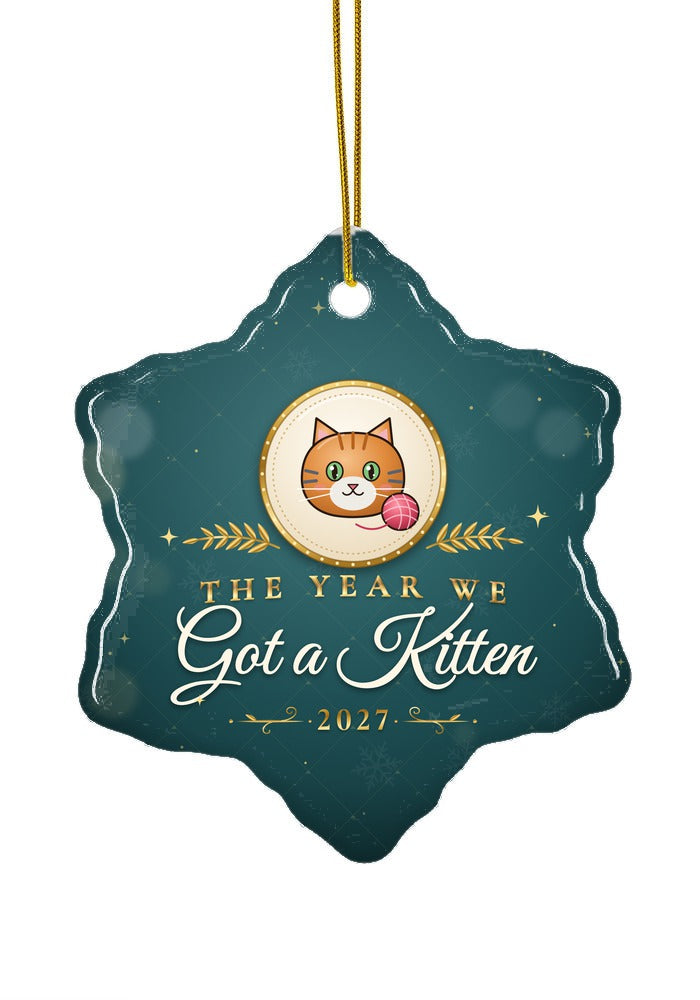 Got a Kitten ornament dated 2027, snowflake shape