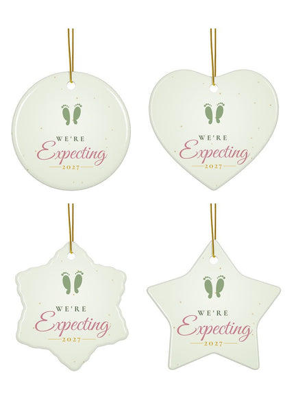 We're Expecting ornament in circle, heart, snowflake and star